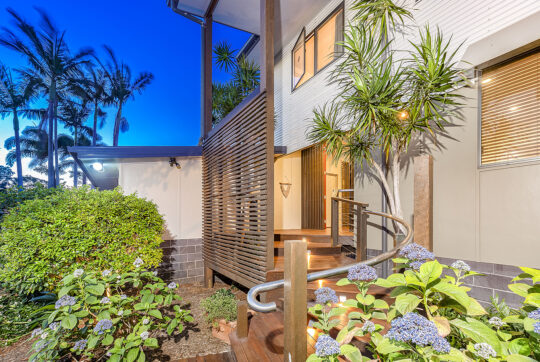 Stairs and garden leading to house