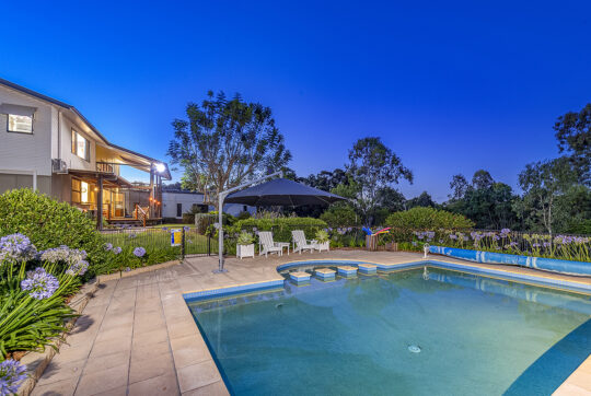 View looking back to the house from pool yard