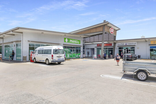 Looking at Burnett Heads shopping centre from the carpark at the main entry