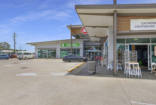 Looking at Burnett Heads shopping centre from the carpark at the main entry near the bakery