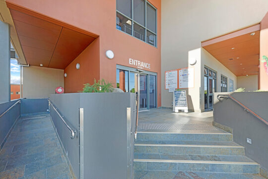 Ramp and stairs to entrance of IWC building