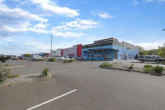 Carpark view showing the three stores Choice, World Gym and Road Tech Marine