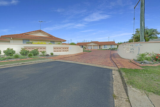 entryway into Palm Garden Villas