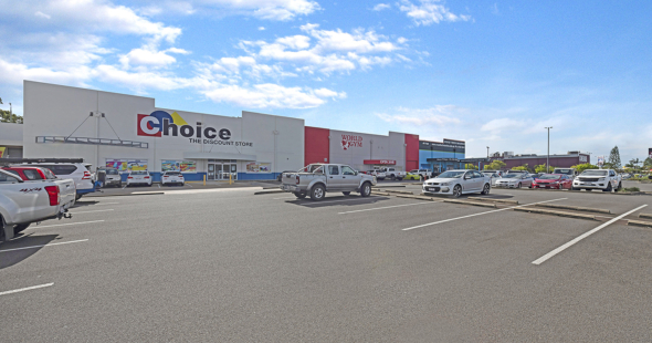 Carpark view showing the three stores Choice, World Gym and Road Tech Marine