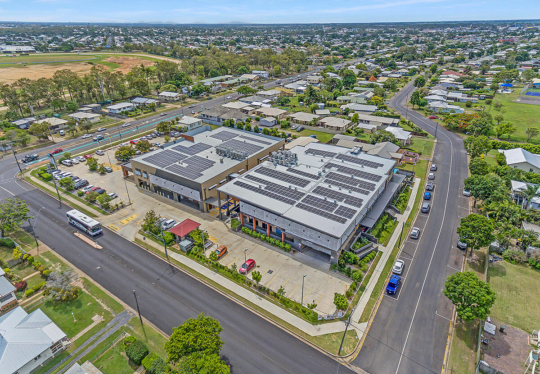 Aerial view of large community complex for IWC by WK Projects feature image